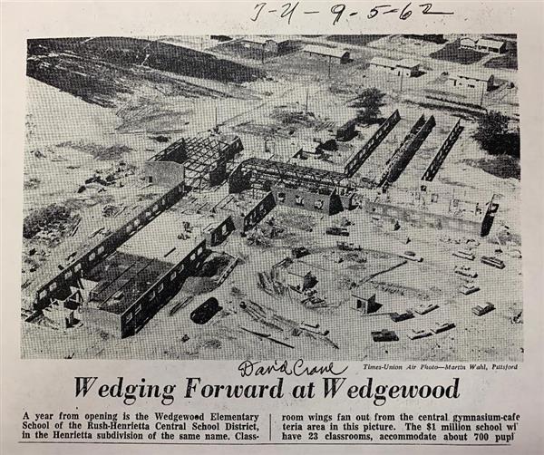 Old newspaper photo of the building under construction taken from above
